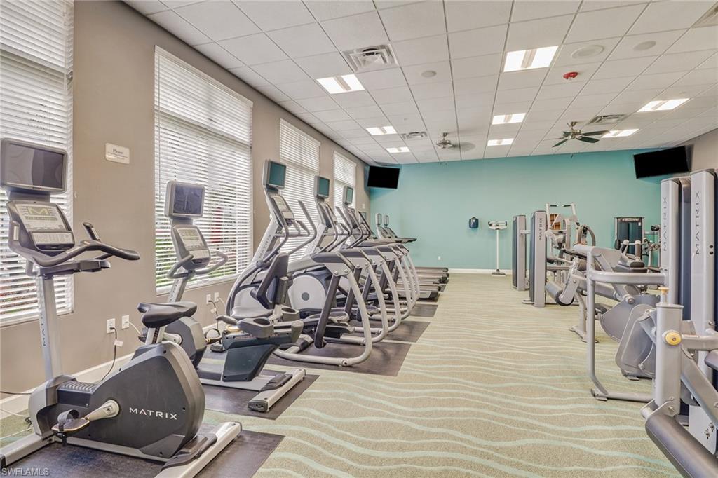 1233 Kendari Terrace Naples, FL 34113 - Photo 26 of 38 a view of a room with gym equipment