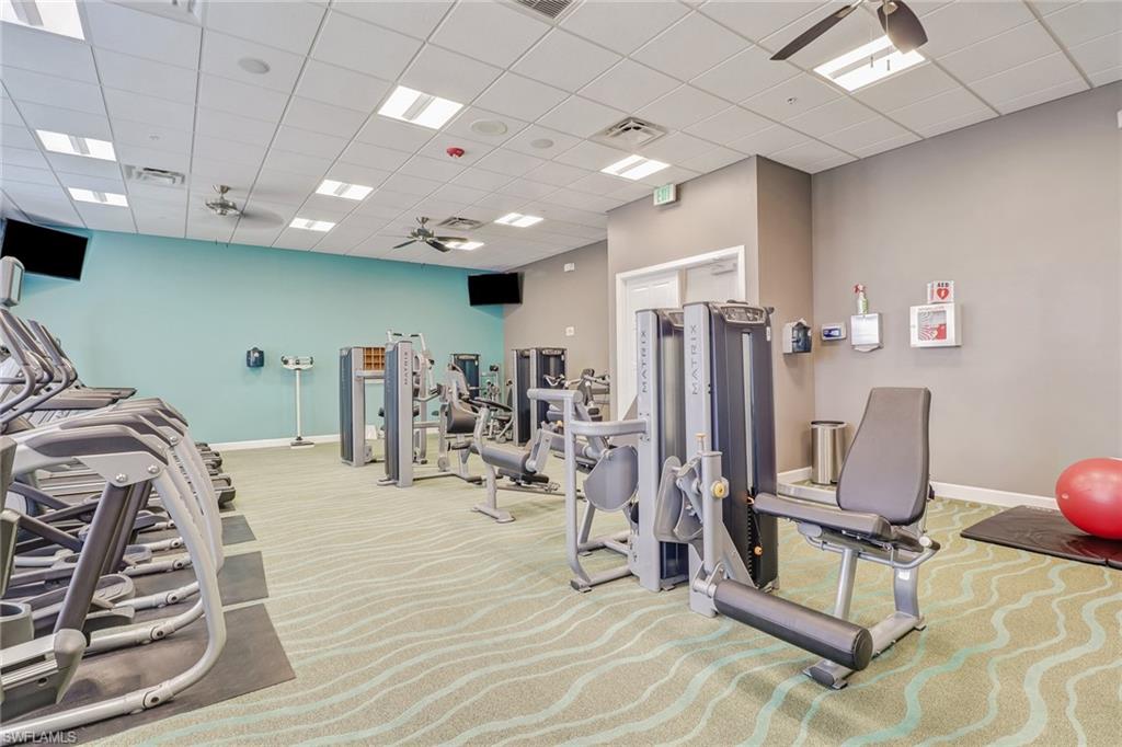 1233 Kendari Terrace Naples, FL 34113 - Photo 27 of 38 a view of a room with gym equipment