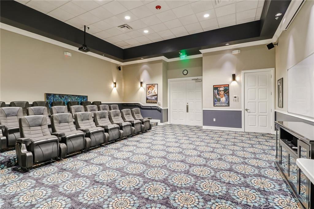 1233 Kendari Terrace Naples, FL 34113 - Photo 31 of 38 a large room with lots of white furniture