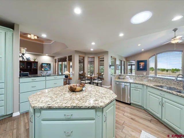 a kitchen with center island and countertop