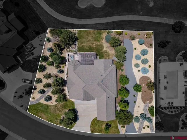 a view of a garden from a balcony