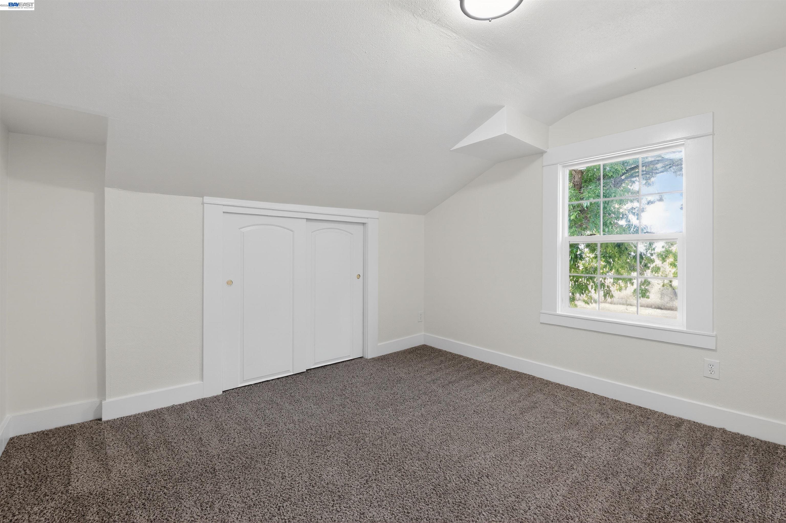 3015 Point Pleasant Road Elk Grove, CA 95757 - Photo 18 of 32 an empty room with windows