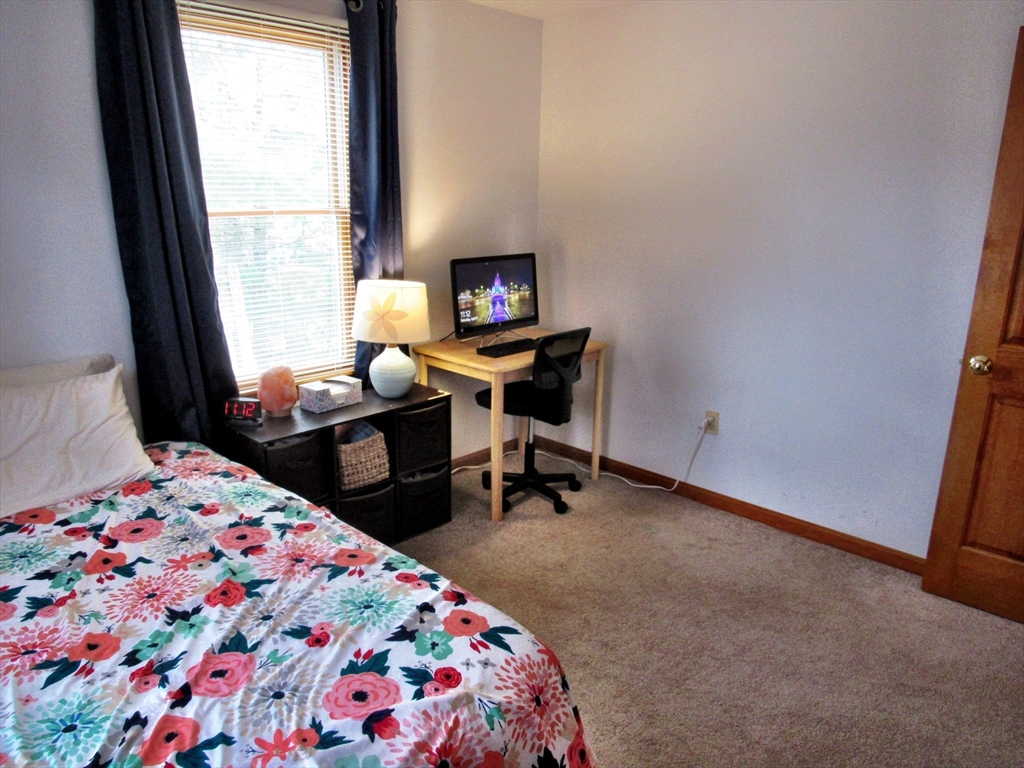 7 Beebe Road Monson, MA 01057 - Photo 18 of 30 a bedroom with a bed and a window