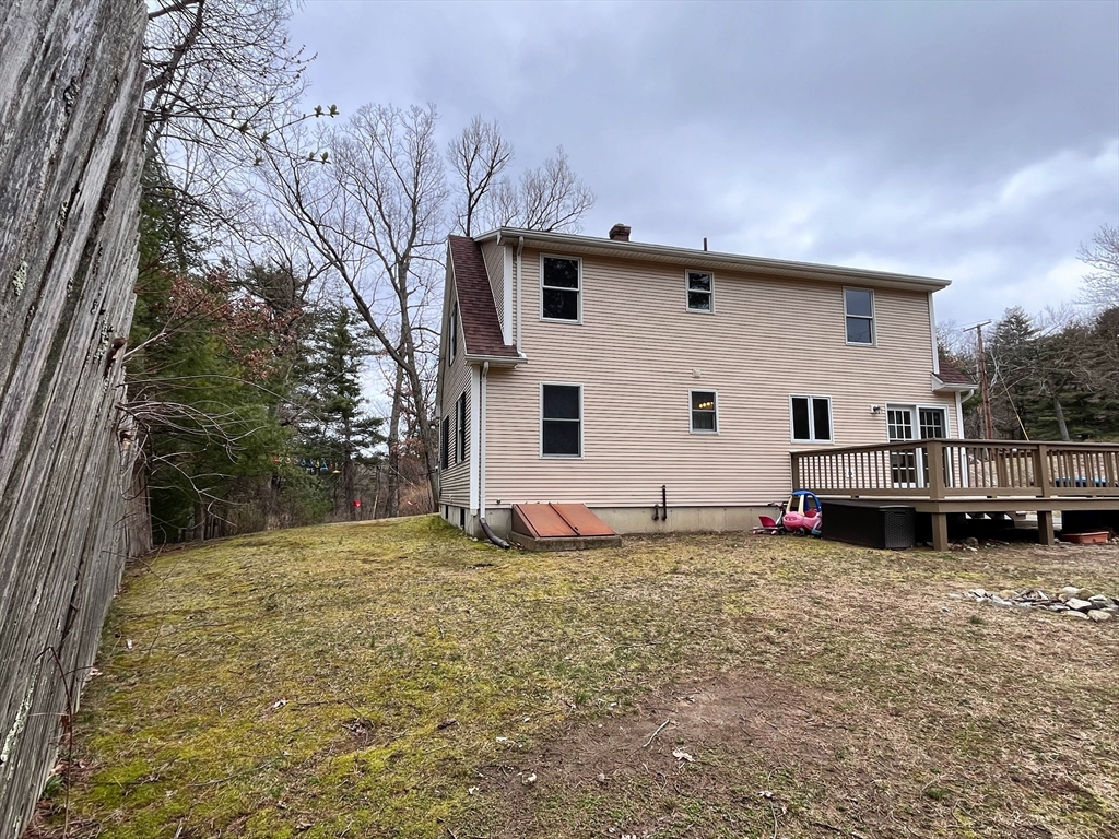 7 Beebe Road Monson, MA 01057 - Photo 3 of 30 a view of a house with a yard