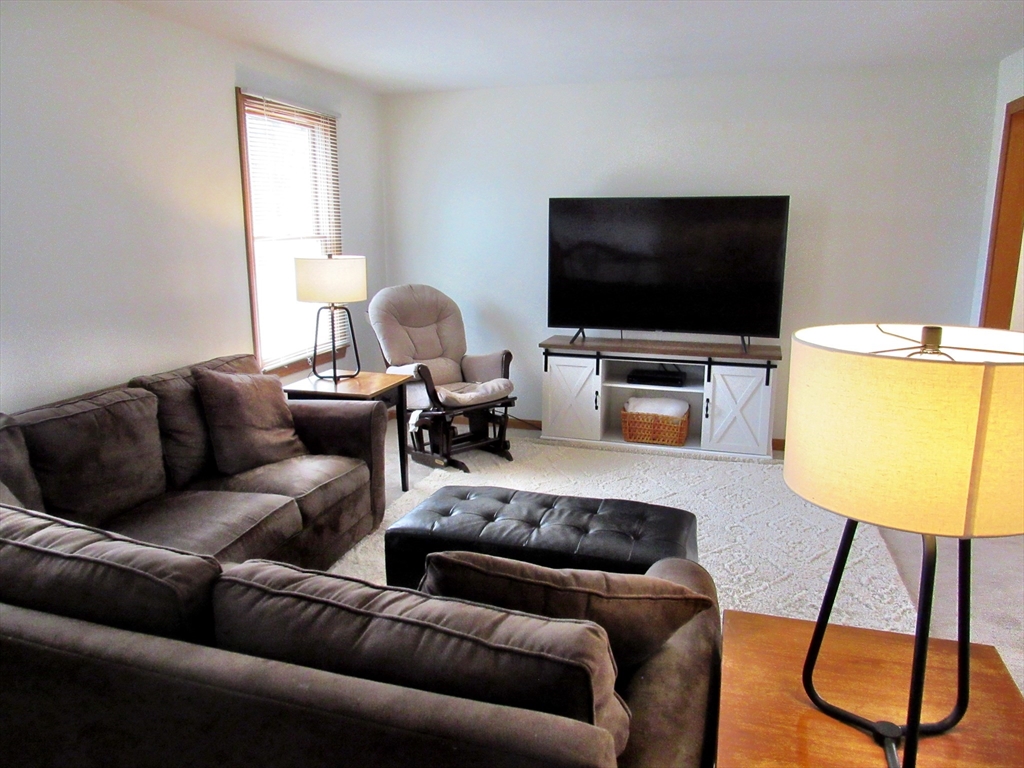 7 Beebe Road Monson, MA 01057 - Photo 5 of 30 a living room with furniture and a flat screen tv