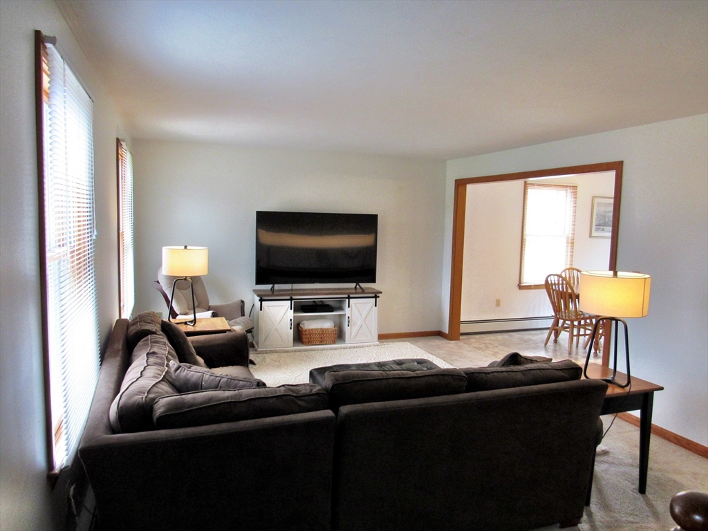 7 Beebe Road Monson, MA 01057 - Photo 6 of 30 a living room with furniture and a flat screen tv