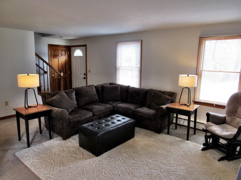 7 Beebe Road Monson, MA 01057 - Photo 7 of 30 a living room with furniture a lamp and a window