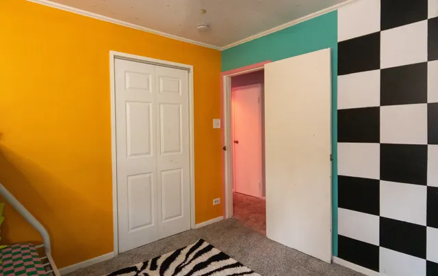 a view of walk in closet with window