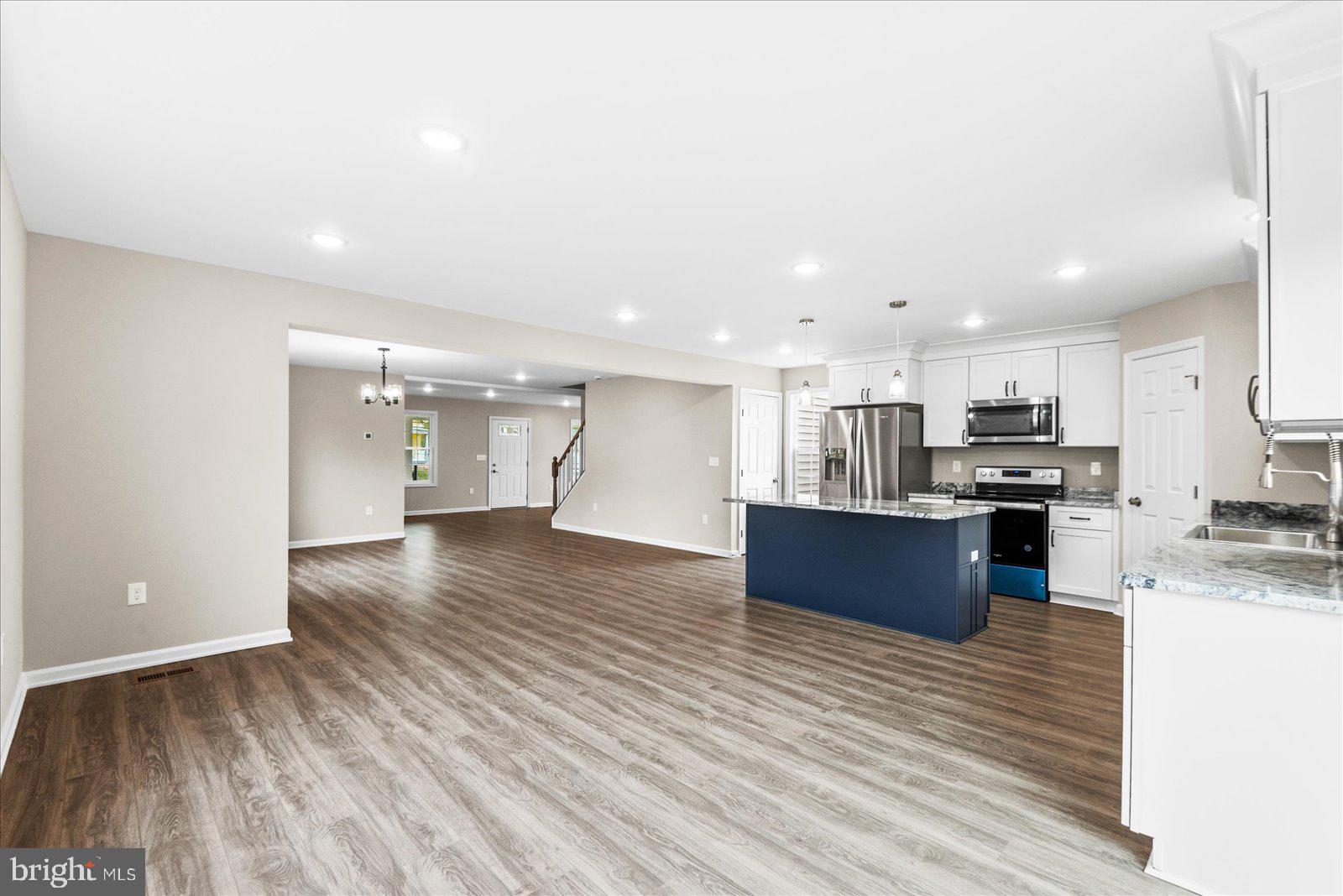914 Old Rixeyville Road Culpeper, VA 22701 - Photo 7 of 47 Open-Concept Kitchen & Living