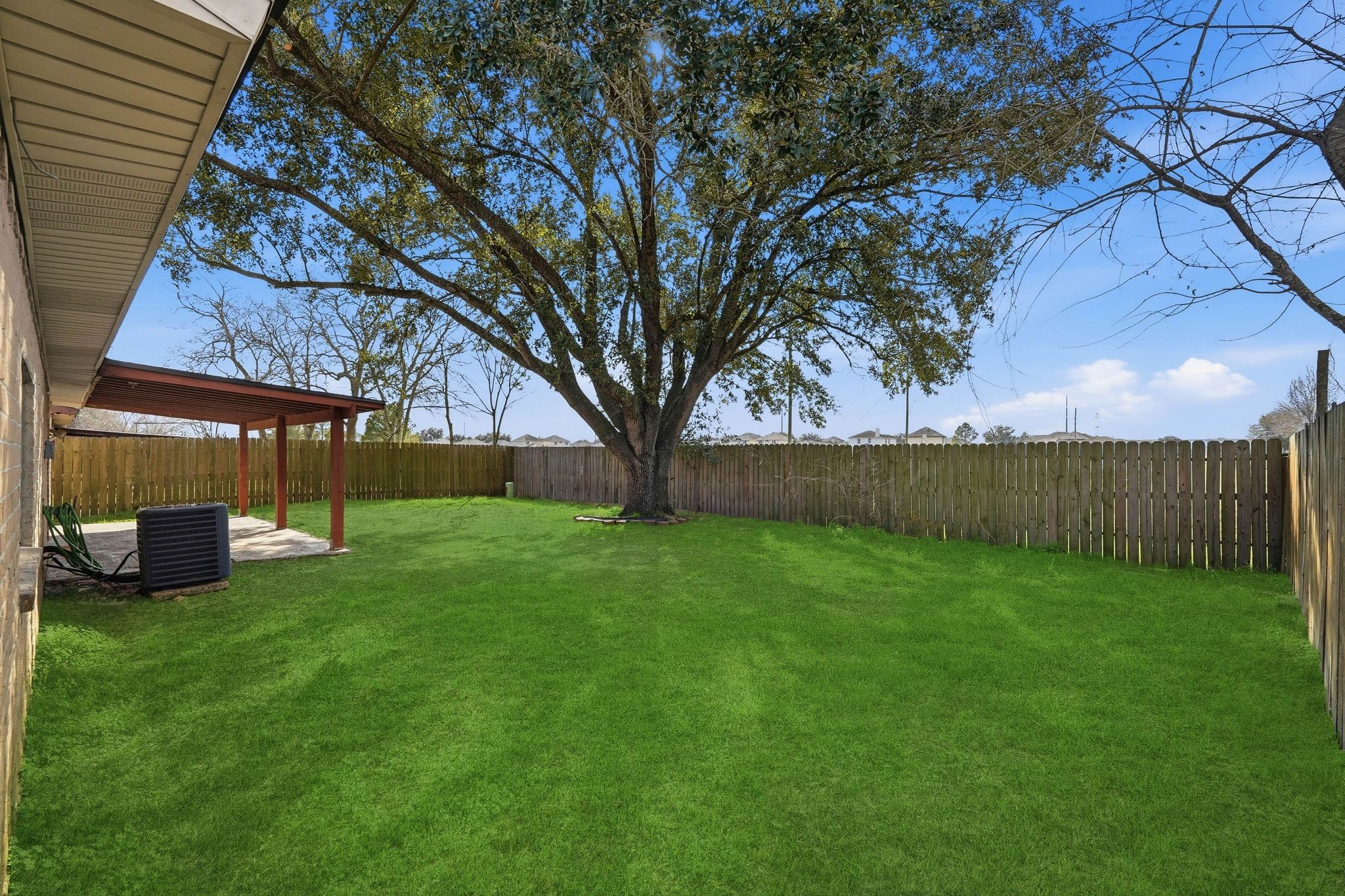 17223 Ranch Country Road Hockley, TX 77447 - Photo 29 of 36 Your spacious backyard has a large mature tree and no rear neighbors for ultimate privacy.