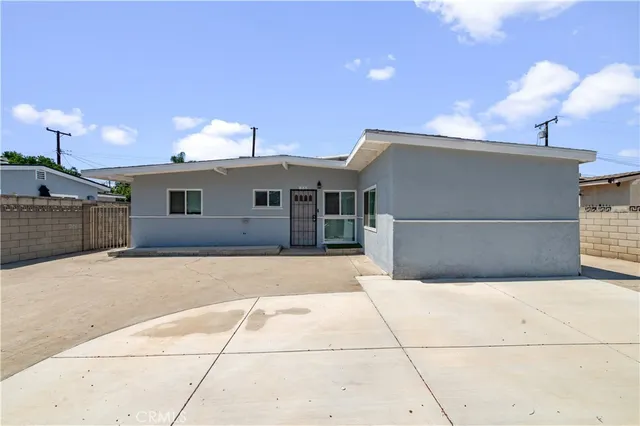a front view of a house with a garage