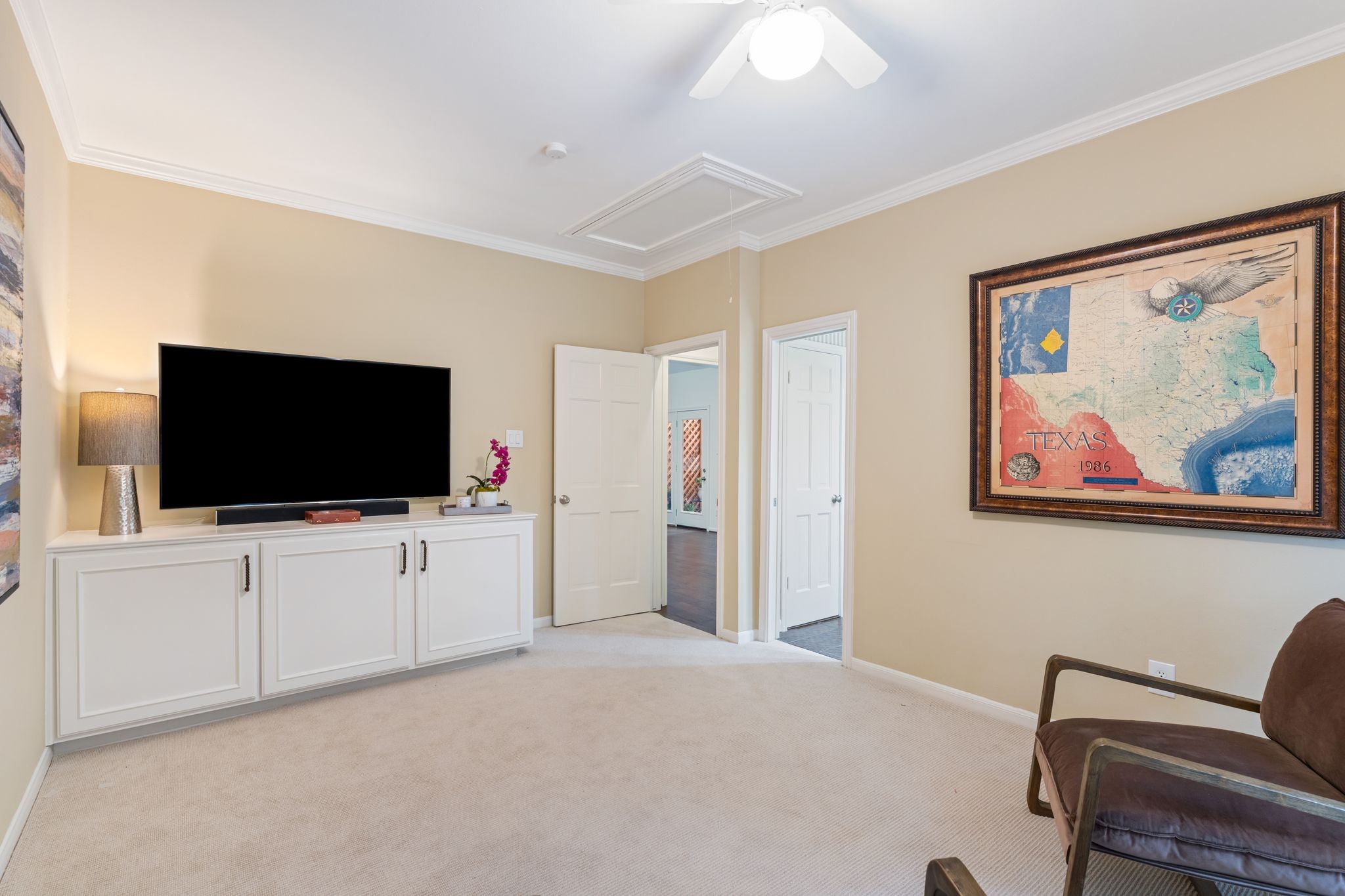 7416 Kelving Street Houston, TX 77030 - Photo 24 of 35 a view of a livingroom with furniture and a flat screen tv