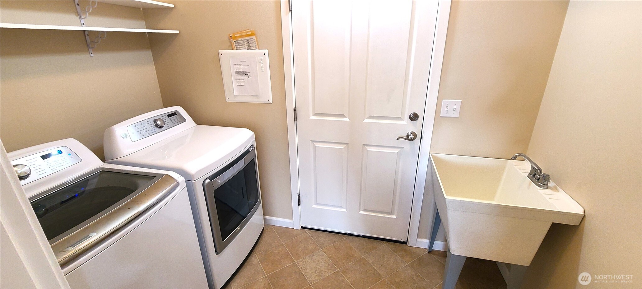 50 Goldenrod Lane Sequim, WA 98382 - Photo 17 of 24 a utility room with dryer and washer