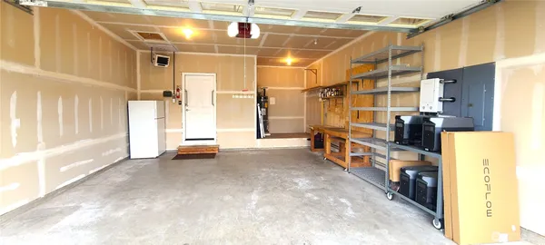 a view of a hallway with seating area