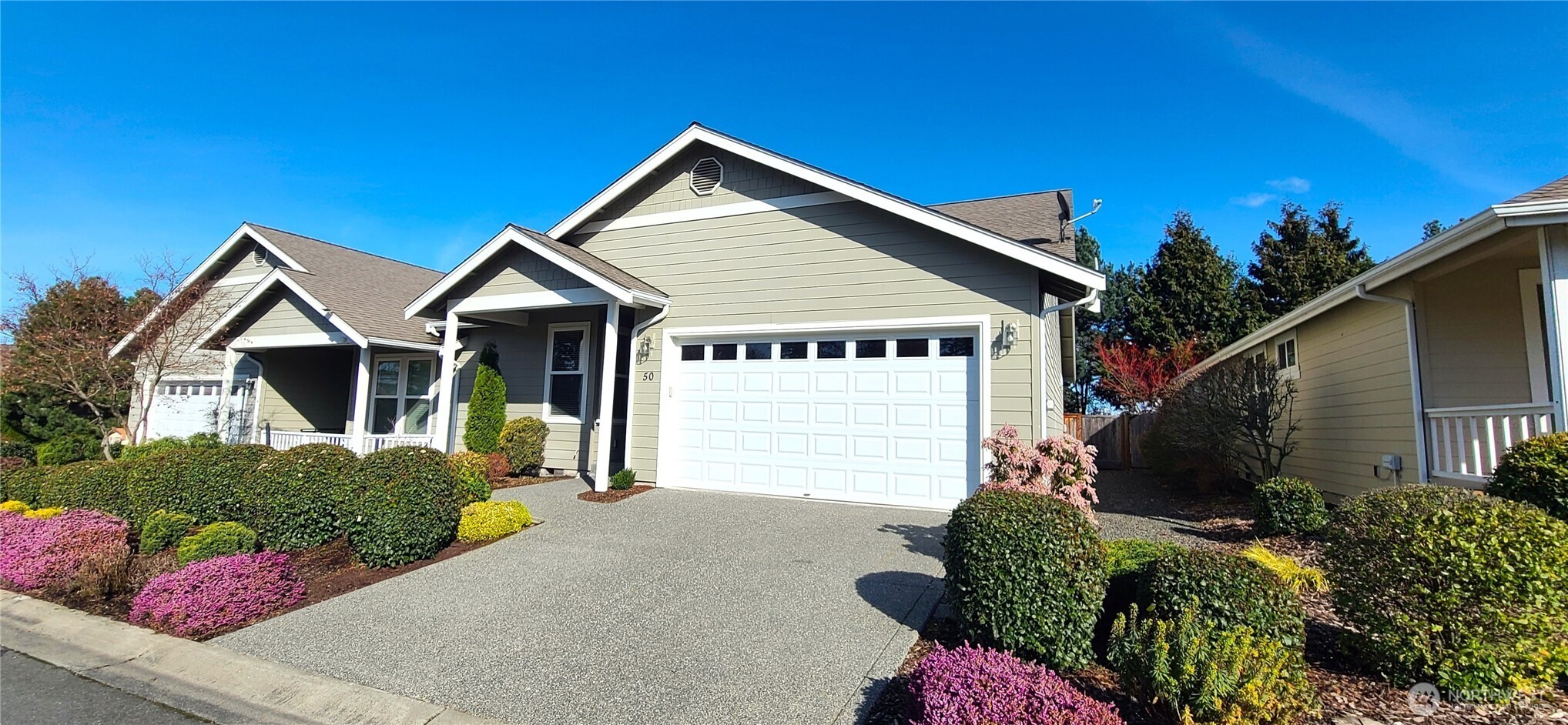 50 Goldenrod Lane Sequim, WA 98382 - Photo 2 of 24 a front view of a house with a yard