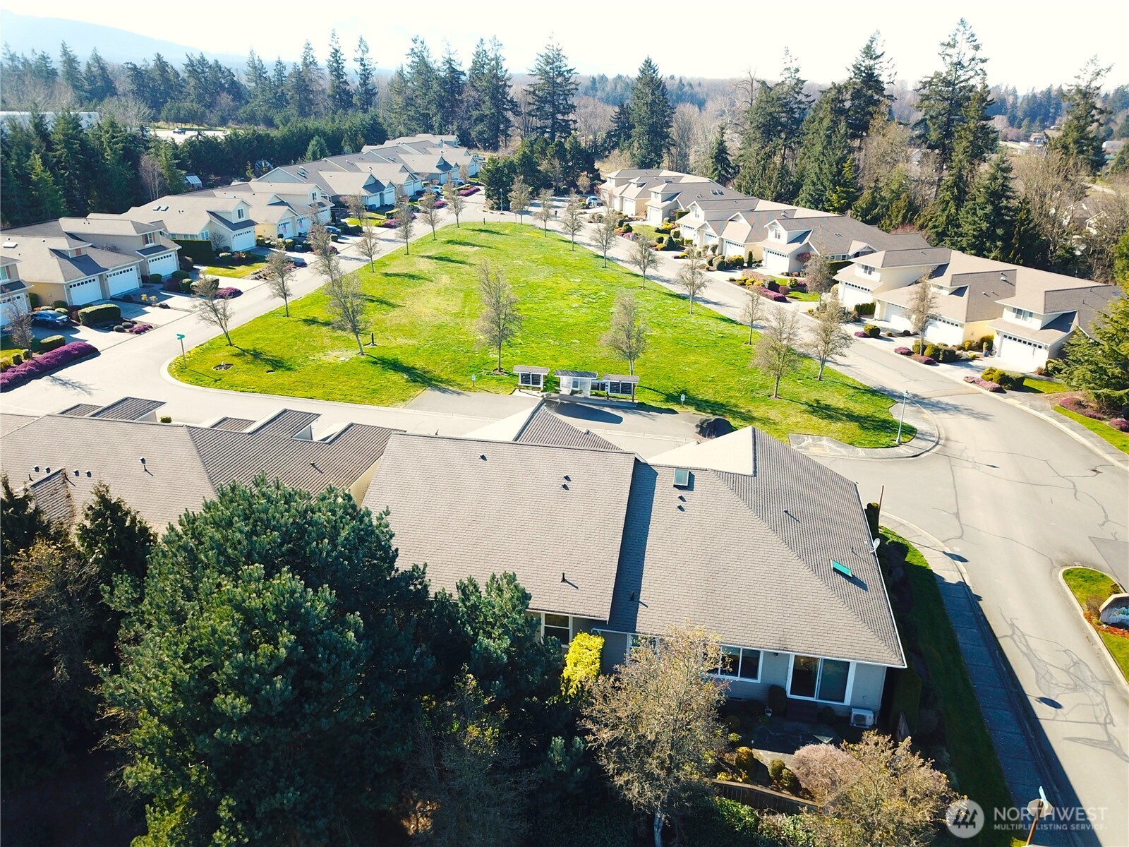 50 Goldenrod Lane Sequim, WA 98382 - Photo 22 of 24 an aerial view of a house with a swimming pool