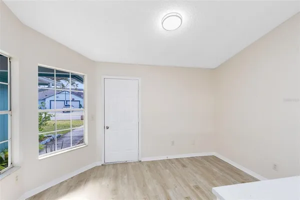 an empty room with windows