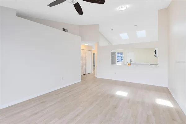 an empty room with closet area