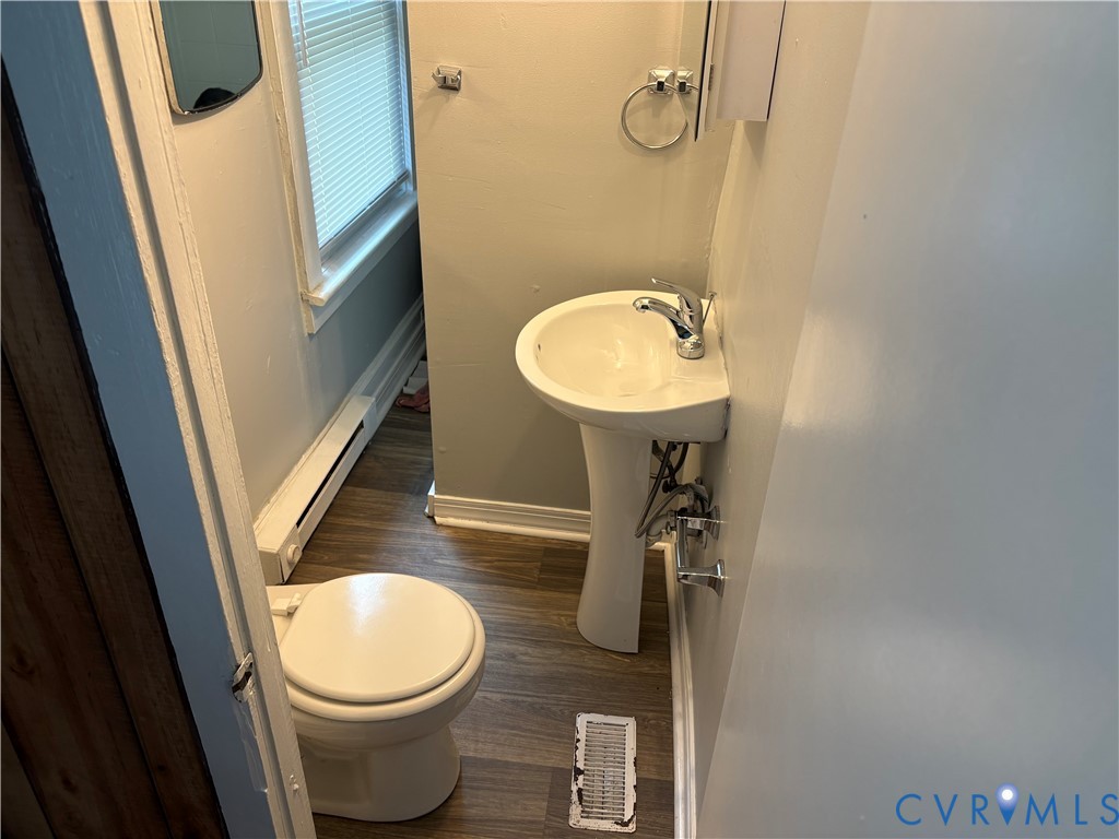 1904 Arlington Road Hopewell, VA 23860 - Photo 5 of 13 Bath featuring dark wood-type flooring and baseboa