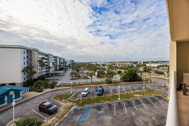 swimming pool view with a seating space