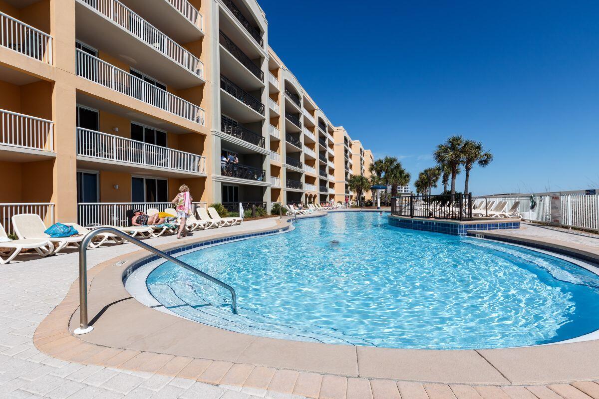 1150 Santa Rosa Boulevard, Unit 421 Fort Walton Beach, FL 32548 - Photo 34 of 46 a view of swimming pool with outdoor seating