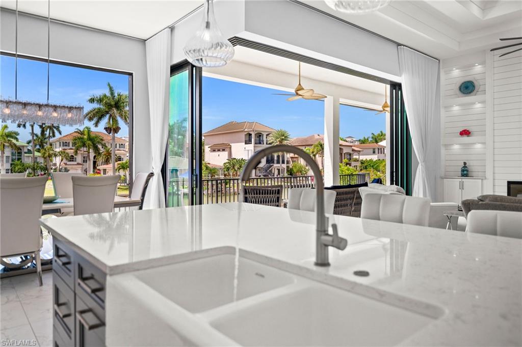 388 Pine Avenue Naples, FL 34108 - Photo 20 of 34 a bathroom with a tub and sink