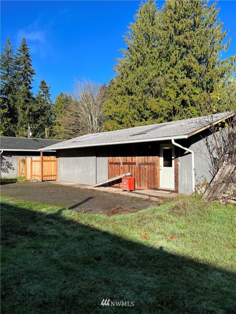 2163 O Brien Road Port Angeles, WA 98362 - Photo 14 of 24 a backyard of a house with lots of green space