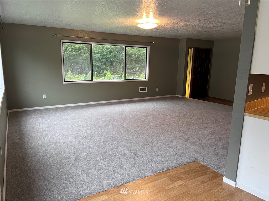2163 O Brien Road Port Angeles, WA 98362 - Photo 4 of 24 an empty room with windows