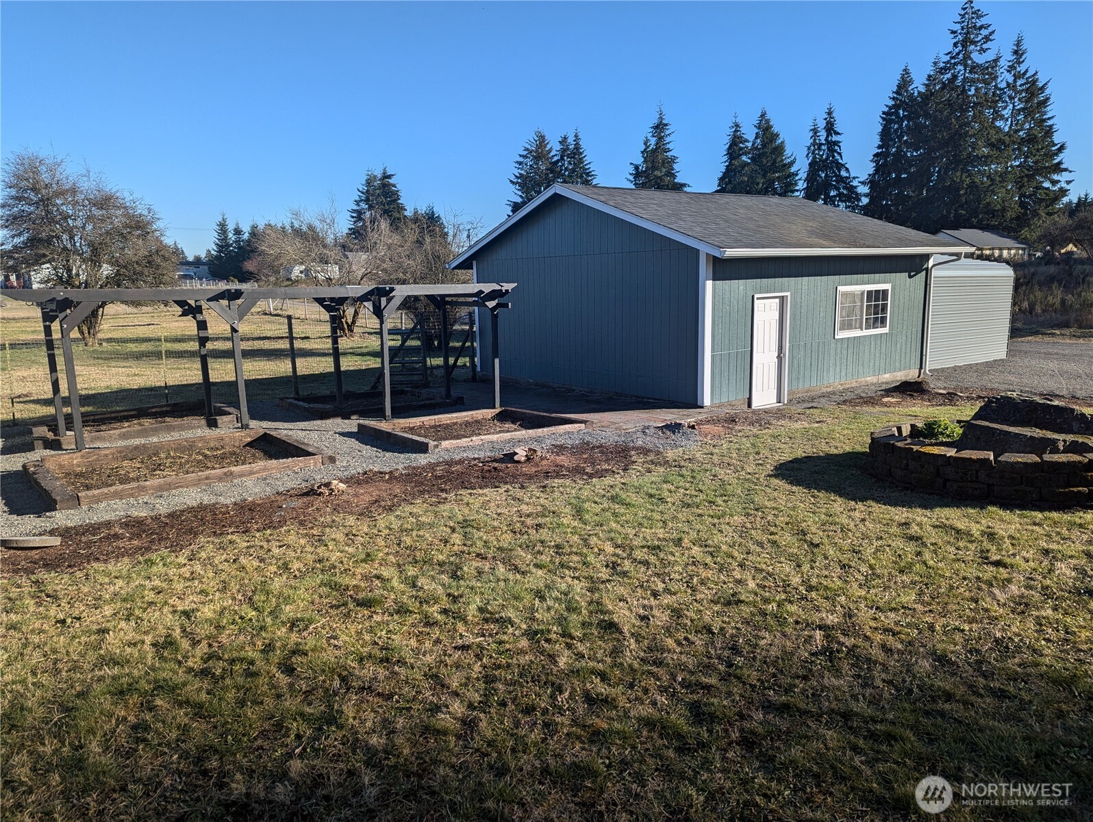 17907 Jordan Street Southwest Rochester, WA 98579 - Photo 3 of 28 a view of a house with backyard and trees