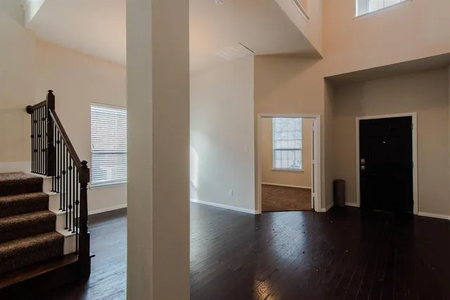 a view of entryway with wooden floor