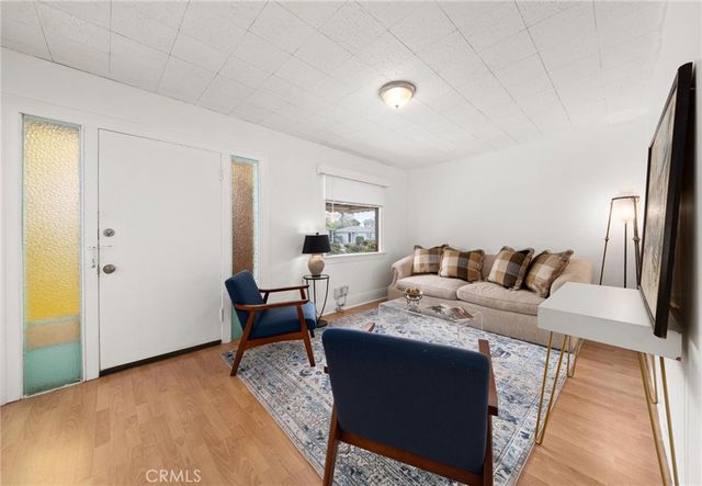 a living room with furniture and a couch