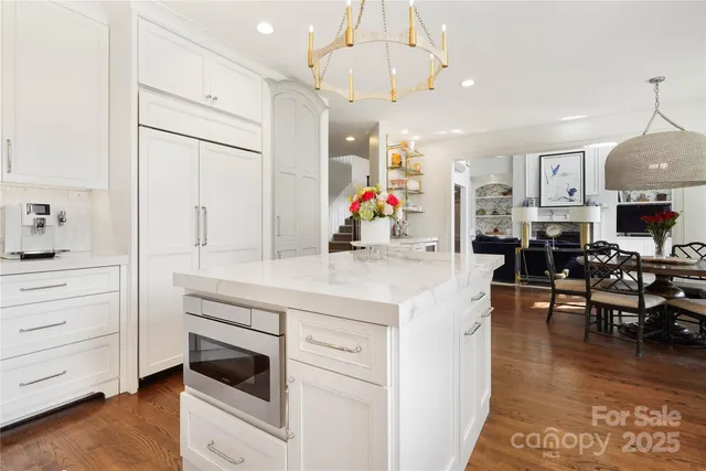 a view of living room and kitchen