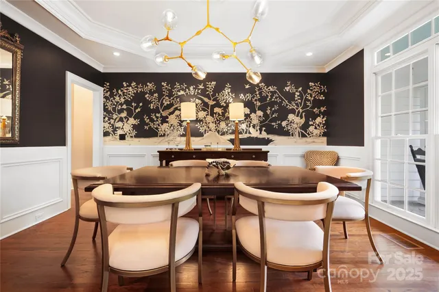 a kitchen with a table and chairs