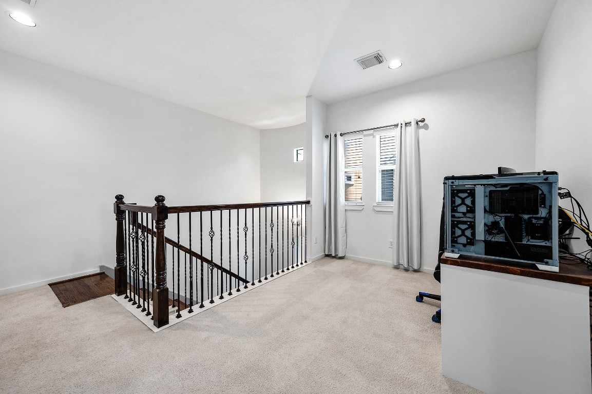 5723 Petty Street Houston, TX 77007 - Photo 23 of 31 a view of a livingroom with a fireplace