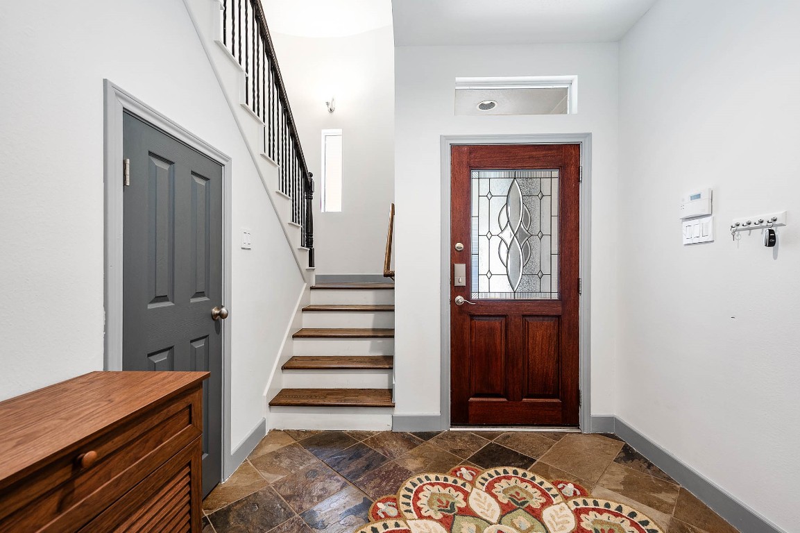 5723 Petty Street Houston, TX 77007 - Photo 8 of 31 a view of an entryway with staircase
