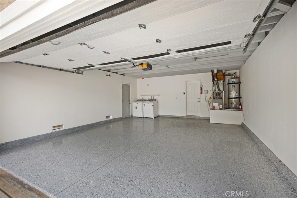 22182 Platino Mission Viejo, CA 92691 - Photo 12 of 18 a view of a garage