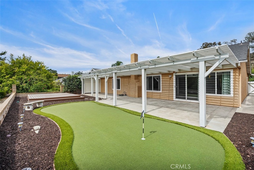 22182 Platino Mission Viejo, CA 92691 - Photo 13 of 18 a view of a house with swimming pool and porch