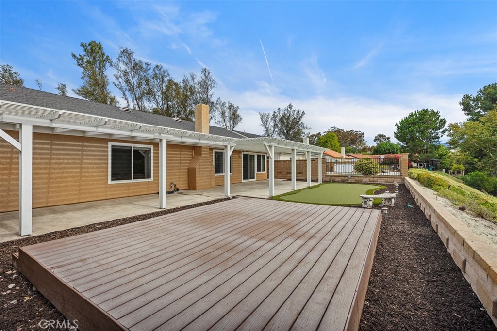 22182 Platino Mission Viejo, CA 92691 - Photo 14 of 18 a view of a house with a backyard