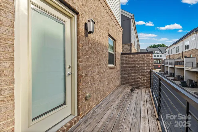a view of a balcony with an outdoor space