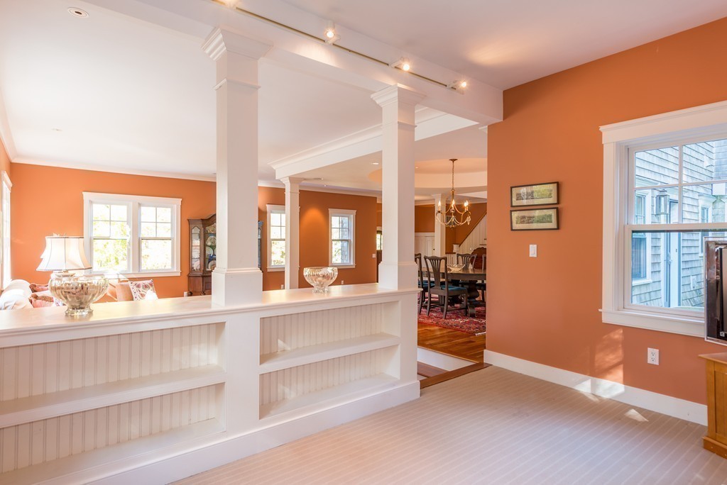 27 Old England Road Ipswich, MA 01938 - Photo 11 of 22 a room with lot of large windows and chandelier