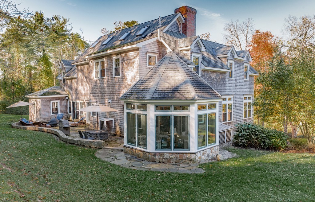 27 Old England Road Ipswich, MA 01938 - Photo 4 of 22 a front view of a house with a garden