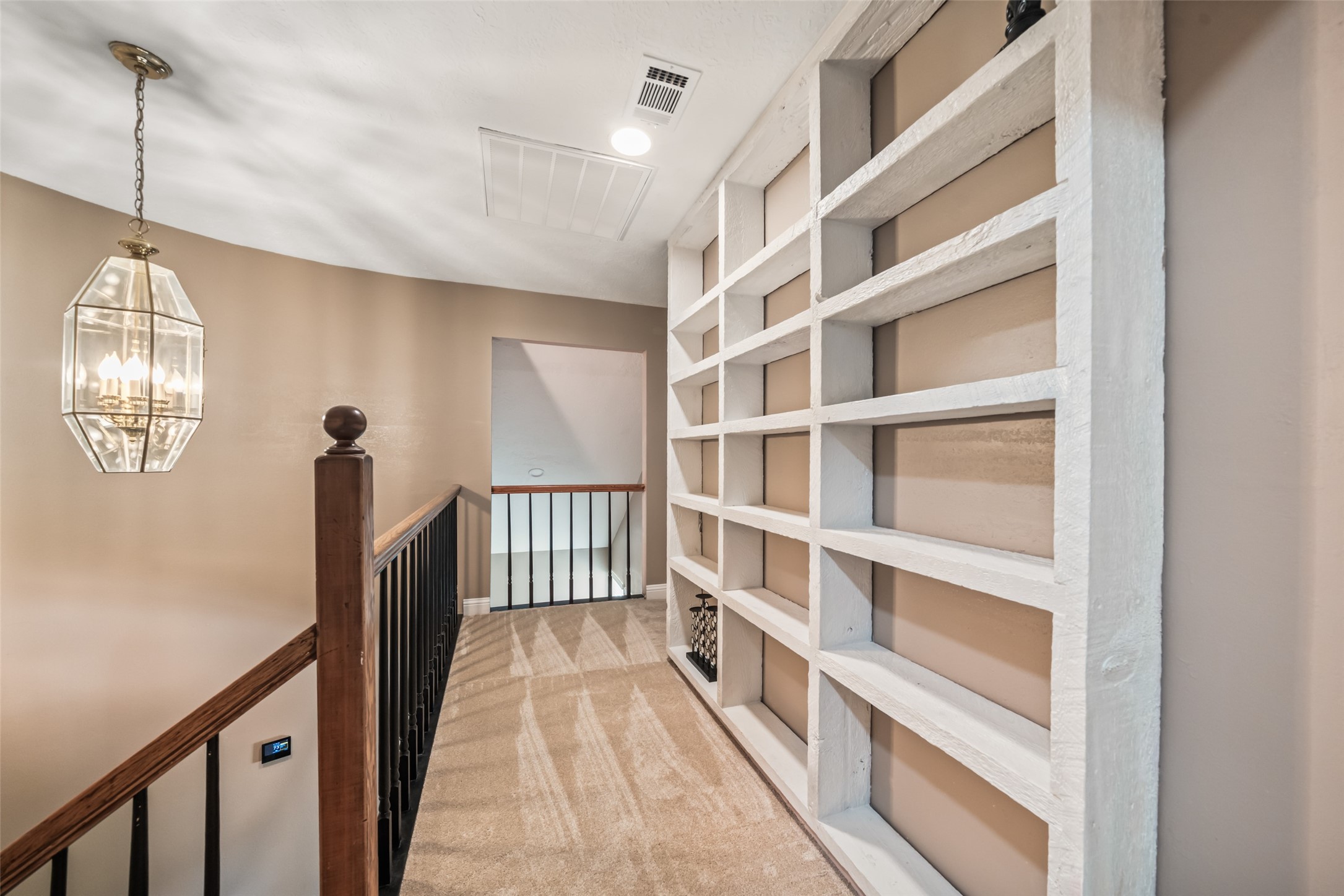 3019 Ramblewood Road Montgomery, TX 77356 - Photo 25 of 40 Upstairs you will find a built-in bookcase.
