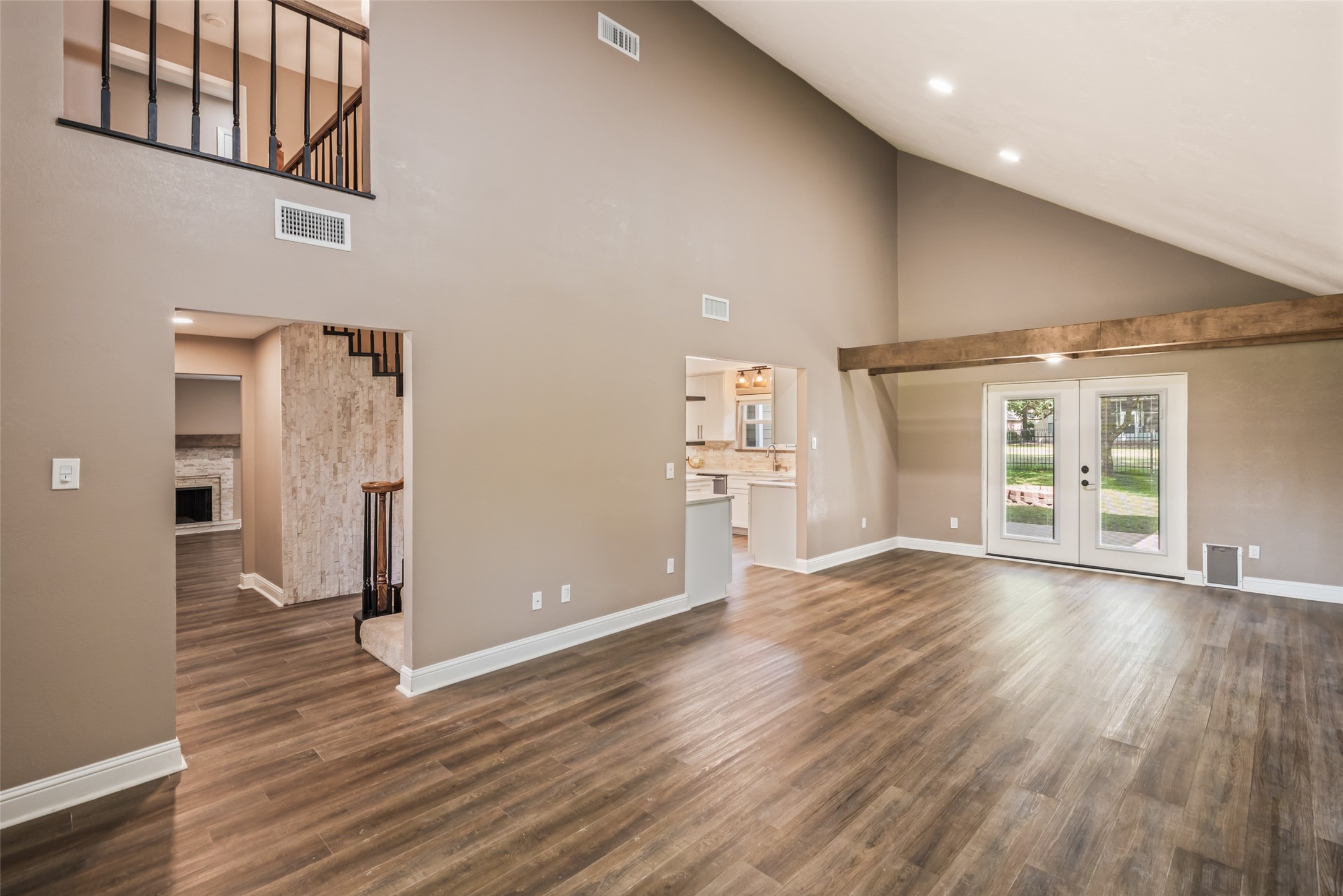 3019 Ramblewood Road Montgomery, TX 77356 - Photo 3 of 40 a view of wooden floor and windows in an empty room