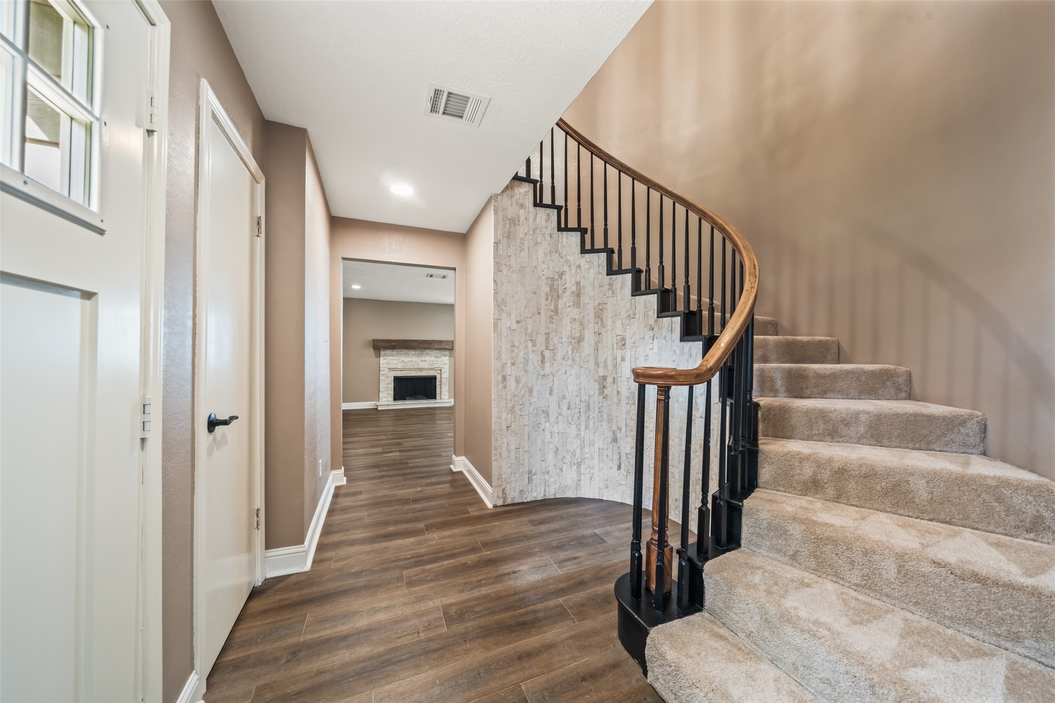 3019 Ramblewood Road Montgomery, TX 77356 - Photo 4 of 40 a view of entryway and hall with wooden floor