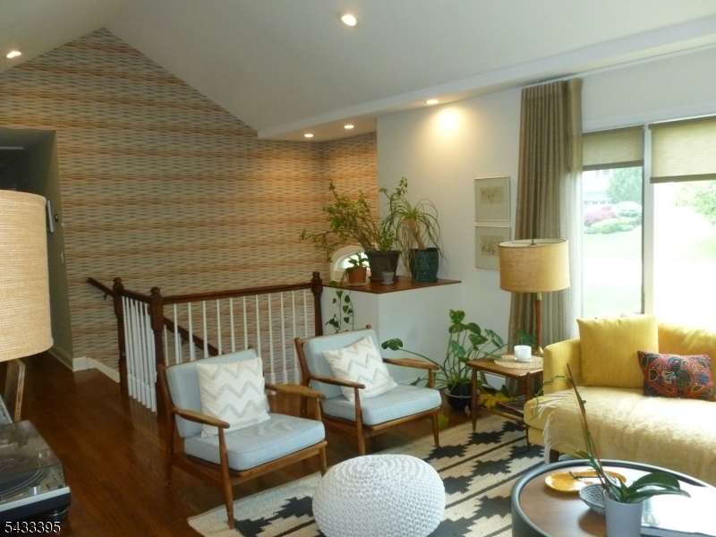 48 Woodmont Road Montclair, NJ 07043 - Photo 2 of 20 a living room with furniture and a lamp