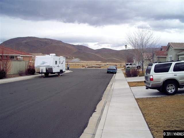 9565 Rusty Nail Court Reno, NV 89521 - Photo 3 of 7 a view of a car parked in front of a house