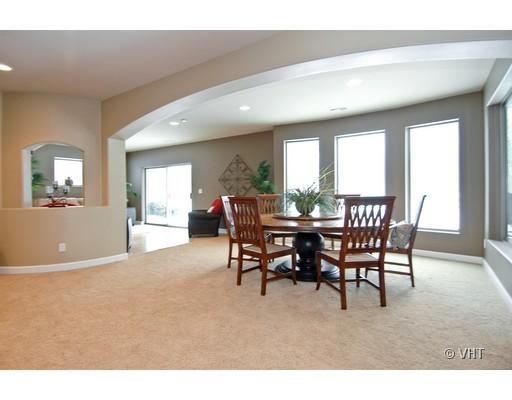 22207 Carmack Road Marengo, IL 60152 - Photo 7 of 16 a view of a dining room with furniture and a large window