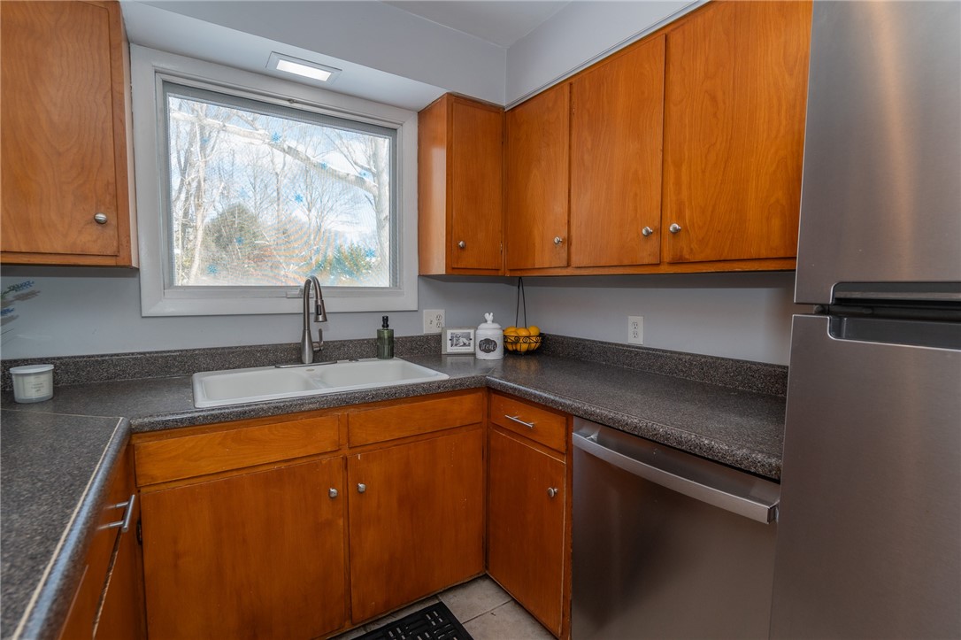 711 S Road South Kingstown, RI 02879 - Photo 9 of 32 View of the beautiful yard over the sink