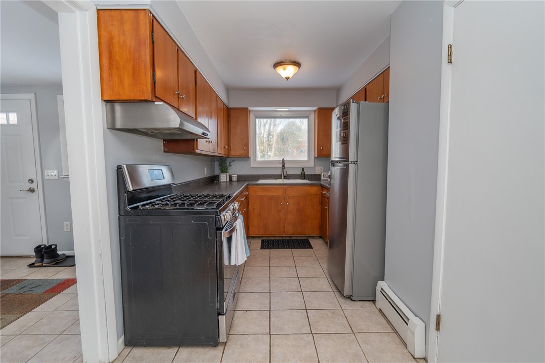 711 S Road South Kingstown, RI 02879 - Photo 10 of 32 Back entry/mudroom adjacent for kitchen expansion? You decide!