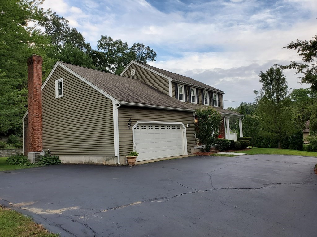 37 Merrill Road Sutton, MA 01590 - Photo 3 of 42 a view of house with outdoor space and parking